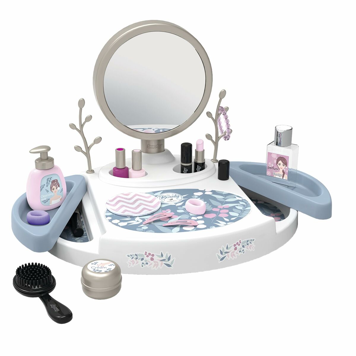 Ett vitt barnsminkbord med en rund spegel, innehållandes diverse leksaks-makeup som nagellack, läppstift, en parfymflaska, en rosa tvålpump, en svart borste och små behållare.