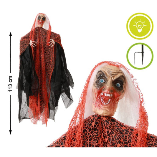 En kombinationsbild som visar den fulla längden på 113 cm och en närbild på den hängande vålnadens ansikte med lysande ögon.