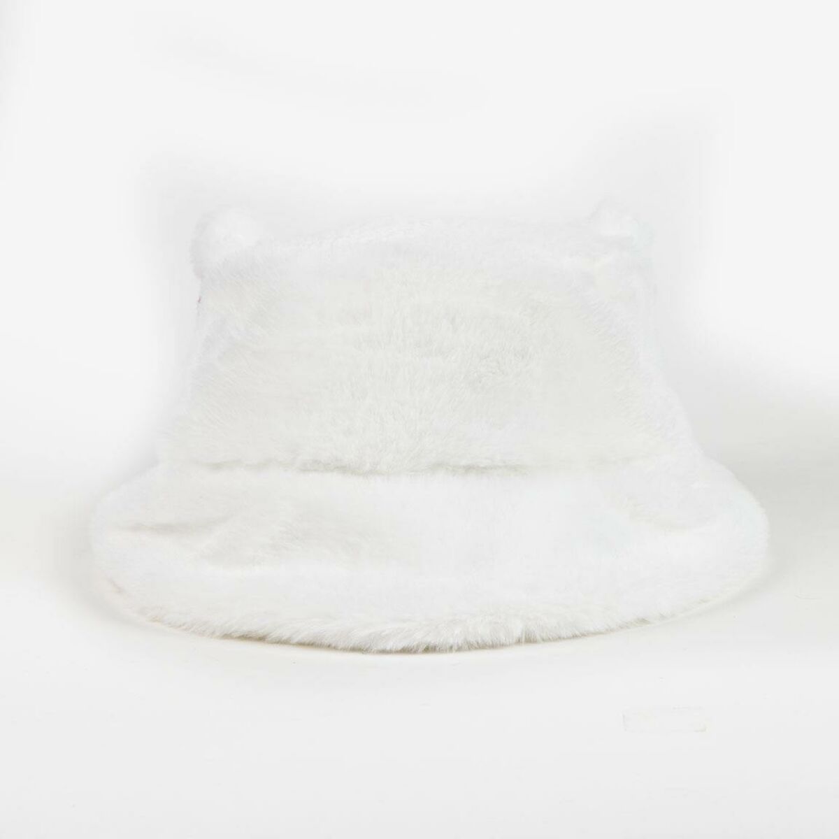 Baksidan av den vita, fluffiga Hello Kitty-hatten.