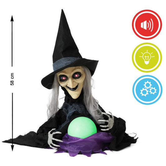 En stående dekoration i form av en Förtrollande Spådomshäxa med lysande röda ögon och en färgskiftande kristallkula, med mått som visar en höjd på 58 cm.