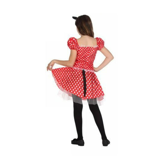 Baksidan av ett barn som bär den röda, prickiga musklänningen, vilket tydligt visar den lilla svarta svansen.