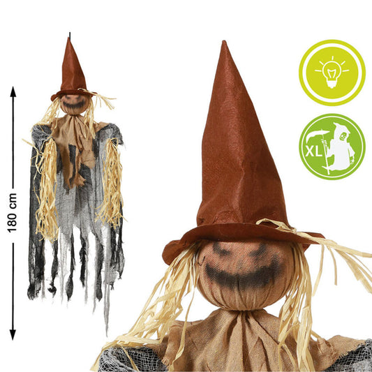 En bild som visar både hela den hängande fågelskrämman och en närbild på dess ansikte, tillsammans med ikoner för ljusfunktion och storlek.