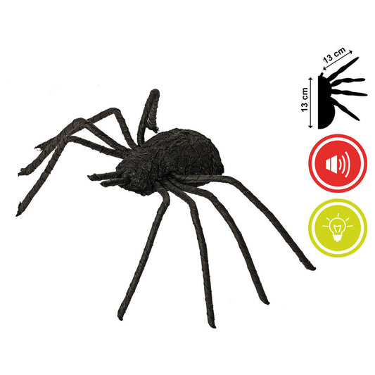 Den svarta spindeln visas med sina mått på 13x13 cm och ikoner som indikerar dess ljud- och ljusfunktioner.