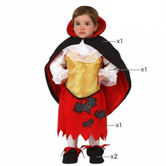 Söt bebis i komplett vampyrdräkt med klänning, mantel och fladdermusdetaljer.