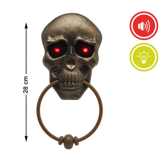 Dödskalle-dörrkläppen som visar dess mått på 28 cm och ikoner för dess ljud- och ljusfunktioner.