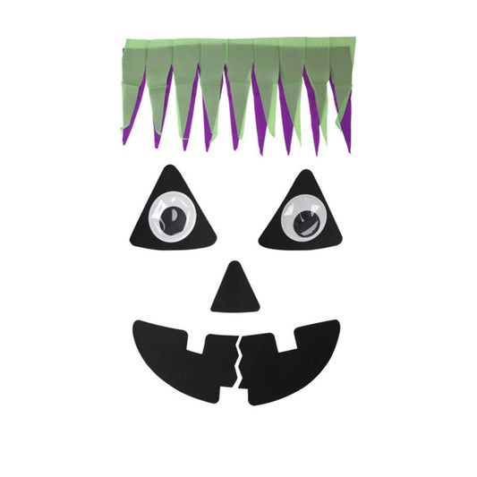 Alla sju delar i dekorationskitet: ögon, nos, mun och en taggig frisyr, mot en vit bakgrund.