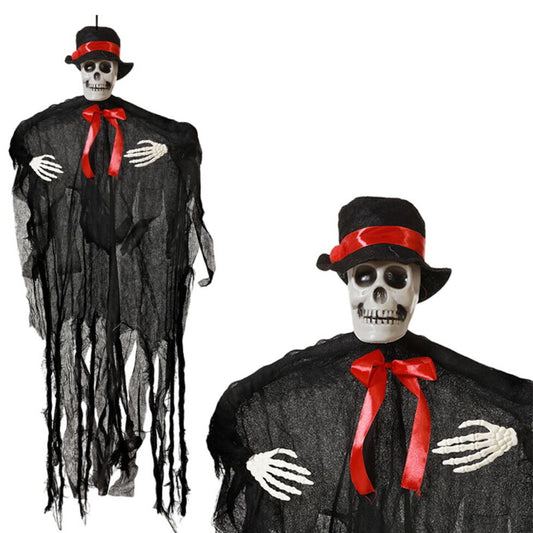 En kombinationsbild som visar den hängande skelett-brudgummen i helfigur och en närbild på hans dödskalle-ansikte med hatt och rosett.