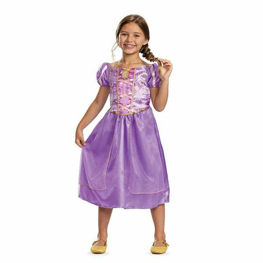 Ett leende barn i en lila maskeraddräkt som liknar en prinsessklänning med puffärmar och gulddetaljer på överdelen.