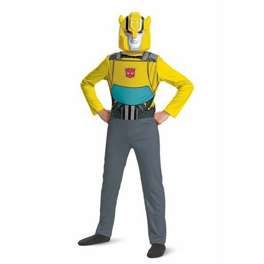 Barn i en gul och grå Transformers Bumblebee maskeraddräkt som består av en mask och en jumpsuit, med händerna på höfterna.