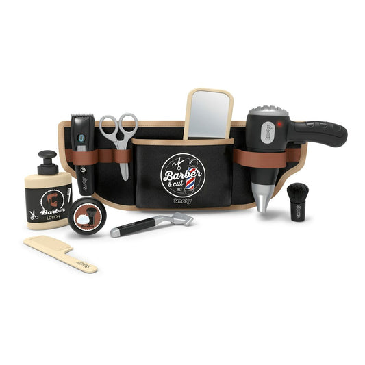 Ett svart och brunt leksaksbälte för barberare fyllt med svarta och beigea tillbehör som en sax, kam, rakhyvel, lotionflaska, spegel och en batteridriven hårfön.