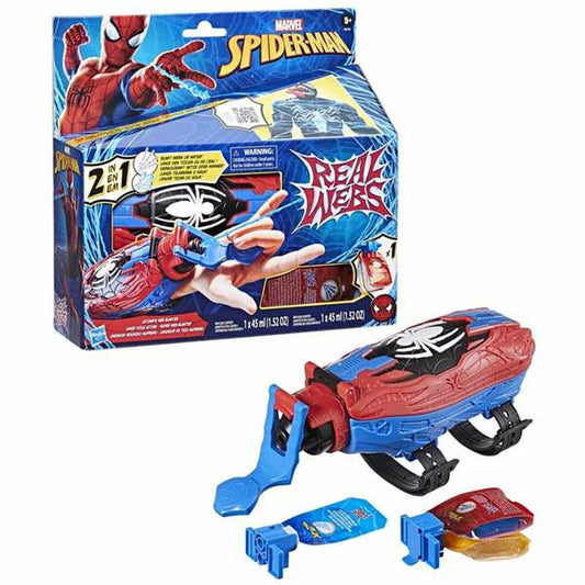 En bild som visar Spider-Man Real Webs Ultimate Web Blaster i sin kartong tillsammans med de lösa tillbehören, som inkluderar två patroner med 'nät' och en del som fästs på handleden.