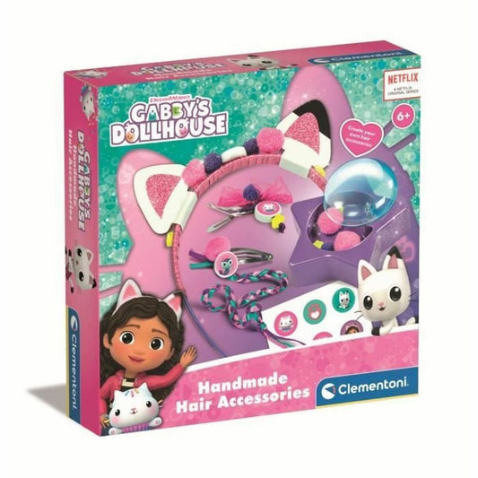 Förpackning till ett Clementoni smink- och pysselset med håraccessoarer från Gabby's Dollhouse, där Gabby och en vit kattfigur syns.