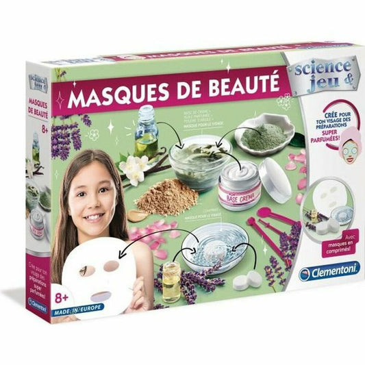 Ett Clementoni Science & Jeu sminkset för barn som visar ingredienser för att blanda egna ansiktsmasker, med en glad flicka som håller upp en vit ansiktsmask i papper.