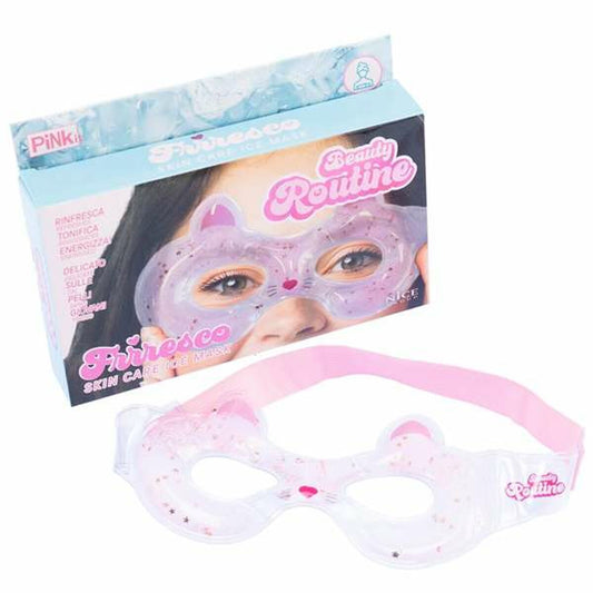 En rosa och lila kattformad ismask för ögonen med glitterinneslutningar och ett rosa justerbart band, bredvid sin ljusblå och rosa förpackning som visar en modell som bär masken.