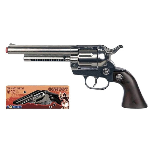 En silverfärgad leksakspistol i cowboy-stil med mörkt, brunt handtag, bredvid sin originalförpackning som tydligt visar texten 'COWBOY' och 'DIE CAST METAL 12'.