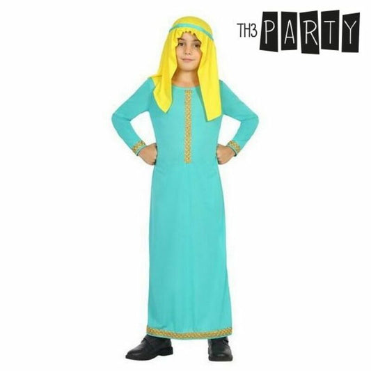 En ung pojke poserar i en långärmad, turkos arabisk maskeraddräkt med gula detaljer och matchande gul turban mot vit bakgrund.