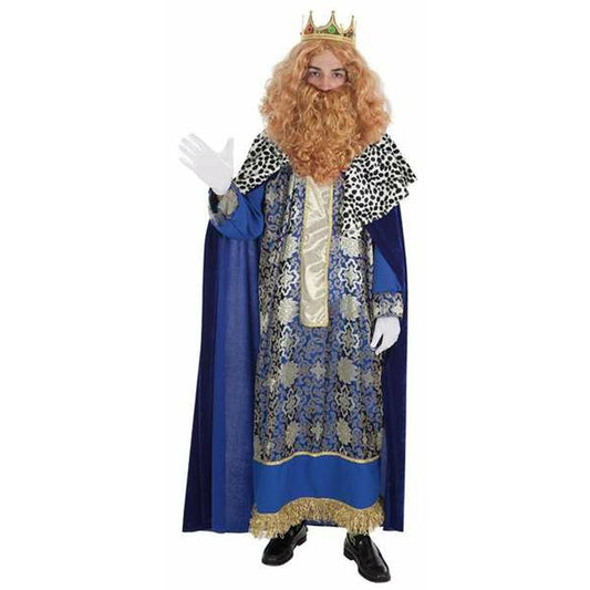 En person klädd i en kunglig maskeraddräkt som föreställer Melchior, med en blå och guldskimrande tunika, en lång blå mantel, en guld-krona, och en peruk med rött skägg.