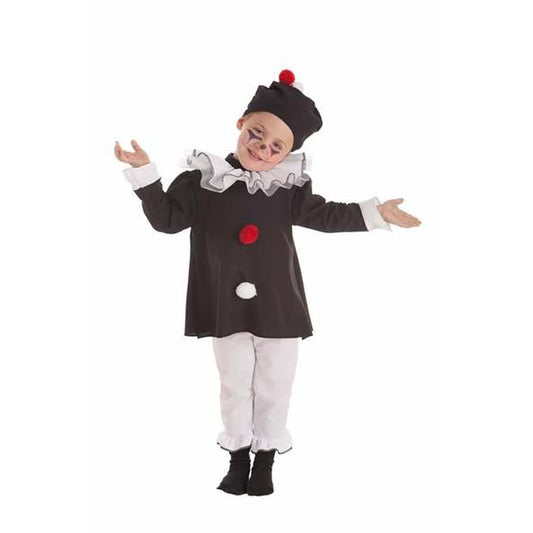 Ett barn poserar i en svart och vit mimare maskeraddräkt som inkluderar en svart tunika med röda och vita pompom-detaljer, vita byxor, en stor vit krage och en svart mössa.