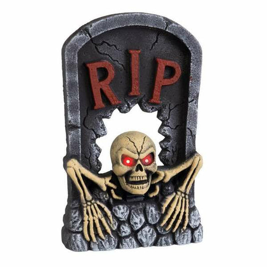 En skrämmande gravsten med texten 'RIP' och ett skelett som sticker ut med lysande röda ögon.
