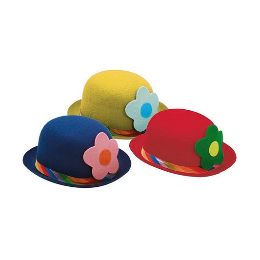 Tre olika plommonstop dekorerat med ett regnbågsfärgat band och en stor rosa filtblomma med röd mitt.