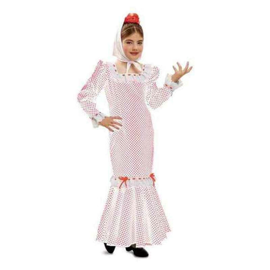 Ett barn poserar i en vit och rödprickig långärmad Flamenco-inspirerad maskeraddräkt med en vit sjal knuten runt huvudet.