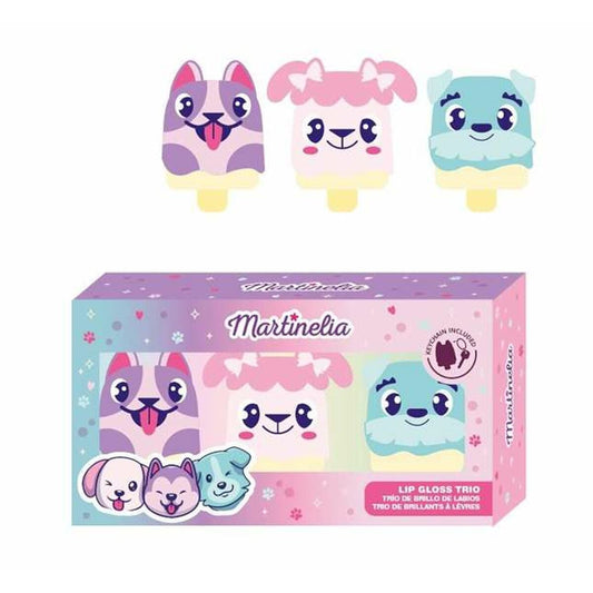 En lila och rosa kartong som innehåller tre läppglans i form av söta hund-inspirerade popsicles i färgerna lila, rosa och blått. En nyckelring medföljer.