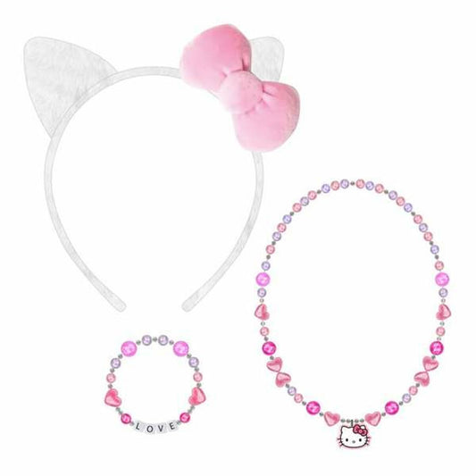 Ett set med tre rosa och vita accessoarer: ett diadem med kattöron och en rosa rosett, ett pärlhalsband med ett Hello Kitty-hänge och ett pärlarmband som stavar 'LOVE'.