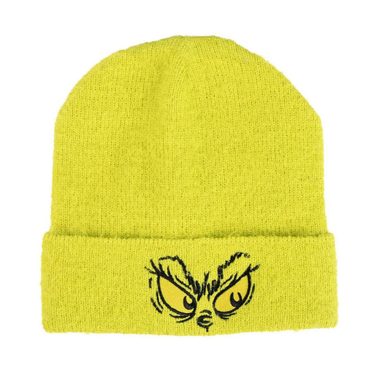 En limegrön stickad barnmössa med uppvikt kant, prydd med ett par broderade, illmariga gula Grinch-ögon.