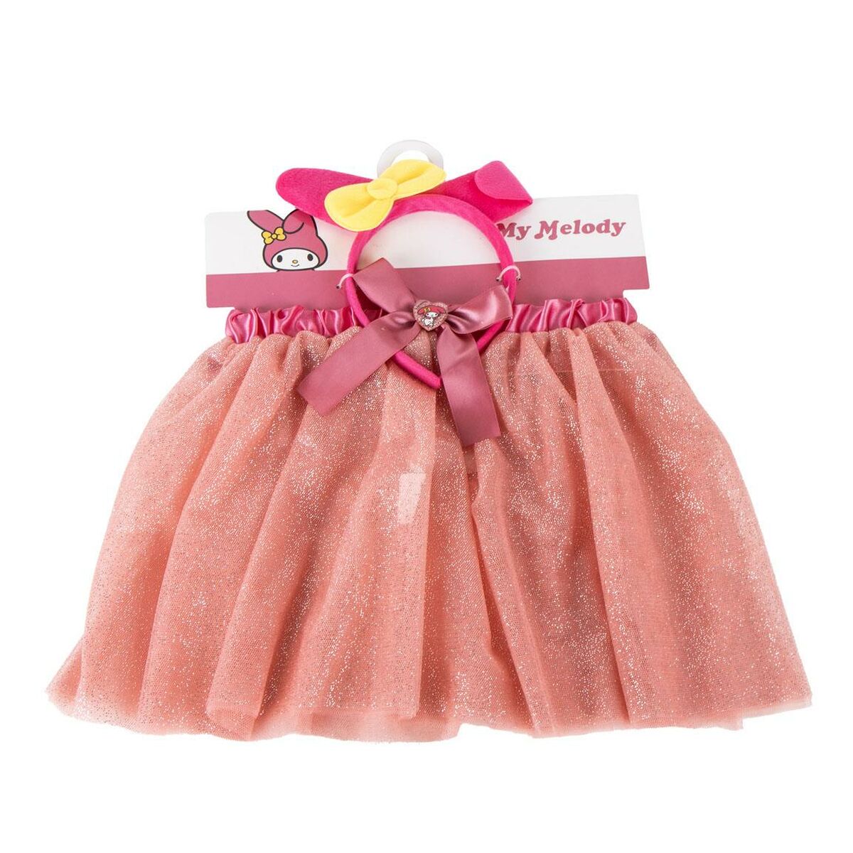 Ett förpackat set med en glittrig rosa tyllkjol och ett rosa diadem med rosett och en liten figur på förpackningen som visar My Melody.