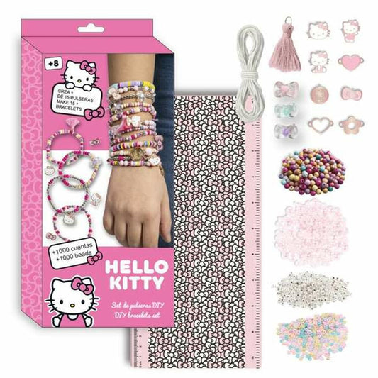En rosa låda med Hello Kitty-tema som visar ett set för att skapa över 15 armband, inklusive påsar med pärlor i olika färger, tofsar, och olika Hello Kitty-berlocker.