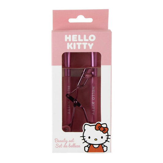 En rosa förpackning med Hello Kitty-tema som innehåller en ögonfransböjare och två rosa tillbehör, märkt som ett 'Beauty set'.