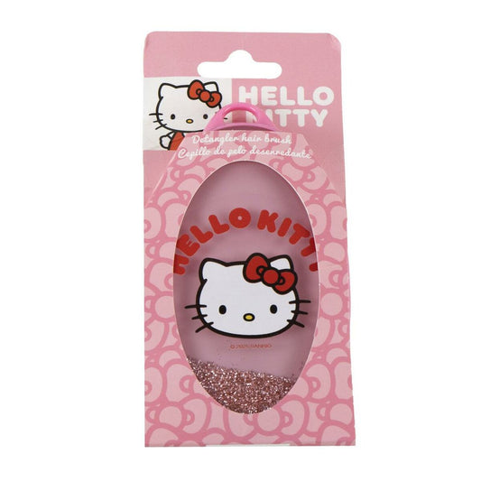 En rosa förpackning med ett utskuret fönster som visar ett hängsmycke med Hello Kitty och rosa glitter i botten.