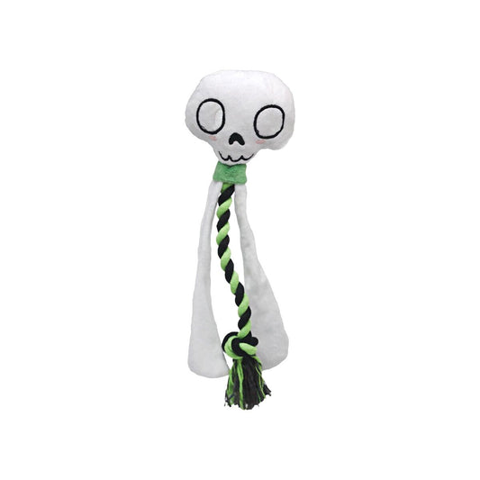 En vit, mjuk halloweendekoration som föreställer ett stiliserat skeletthuvud med stora tomma ögonhålor, en liten mun och en grön halsduk, där en svart- och neongrön tvinnad repdel hänger ner med en tofs i botten.