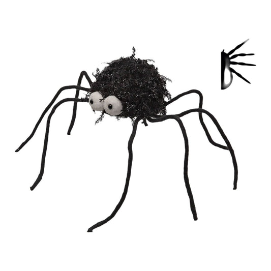 En svart, lurvig Halloween-spindeldekoration med stora, vita stirrande ögon och böjliga, långa ben, mättande cirka 43 cm.