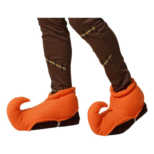 Ett par orange stövelöverdrag med böjda tår, passande till en maskeradkostym, som täcker fötterna och delar av byxorna.