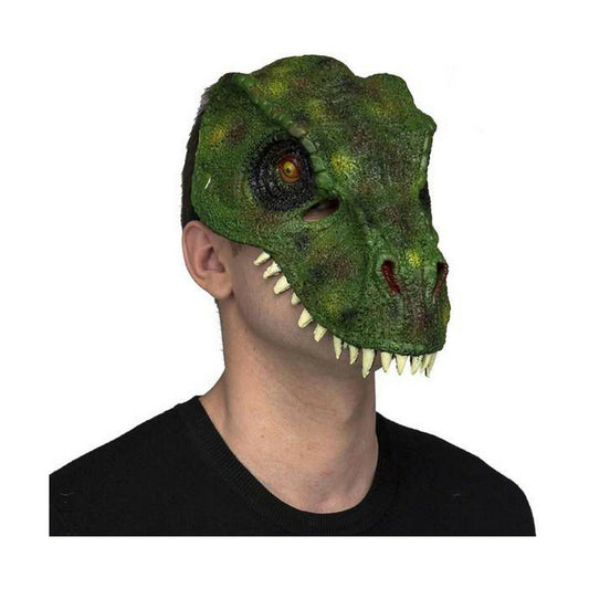 En person bär en Brutal Grön T-Rex Mask i latex, med en realistisk, fjällig textur och vassa tänder.