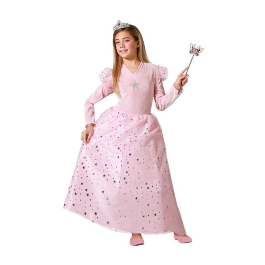 Ett barn ler och poserar i en drömlik rosa stjärnprinsessa-klänning med en stjärnbeströdd kjol och håller i en trollstav.