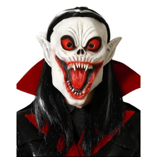 En person bär en Fasansfull Vampyr-Fladdermus Mask i latex, med röda ögon, en stor mun med vassa tänder och svartvitt hår.