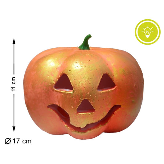 En orange och gyllene pumpa-lampa med dess mått, 11 cm hög och 17 cm i diameter, tydligt utmärkta.