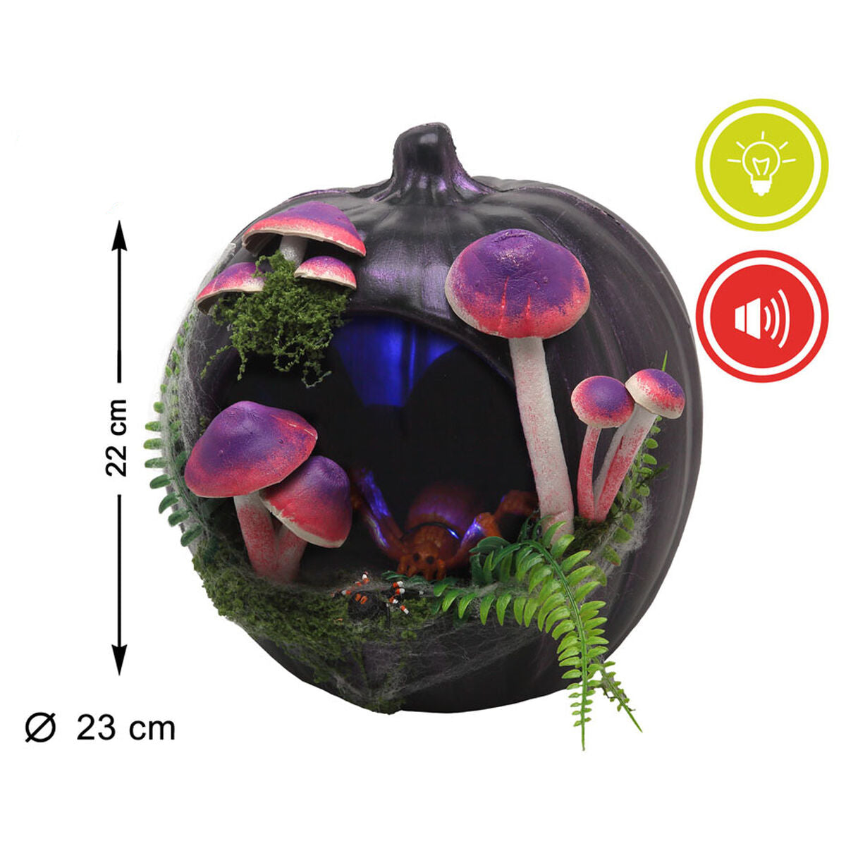 En halloweenpumpa i mörklila med lila svampar, mossa och en spindel i mitten. Bredvid syns symboler som visar att produkten har ljus- och ljudeffekter, samt en måttangivelse som visar att den är 22 cm hög och 23 cm i diameter.