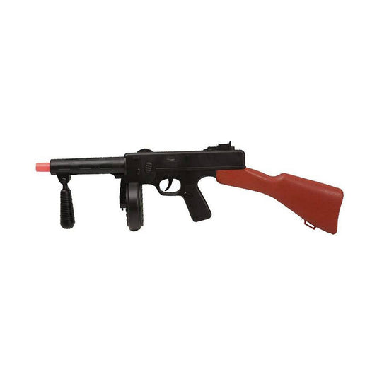 En klassisk, svart leksaks-Tommy Gun med ett brunt handtag och kolv, och en röd säkerhetsplugg i pipan.
