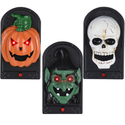 Tre olika varianter av den Kusliga Halloween-Dörrklockan: en pumpa, en häxa och en dödskalle.