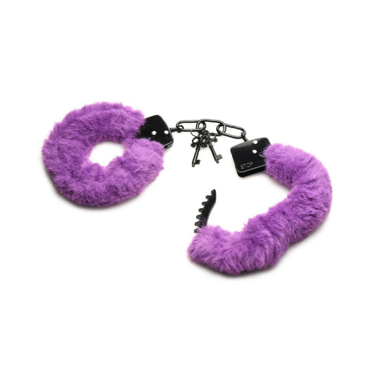 De fluffiga, lila handbojorna är öppna och visar sin form.