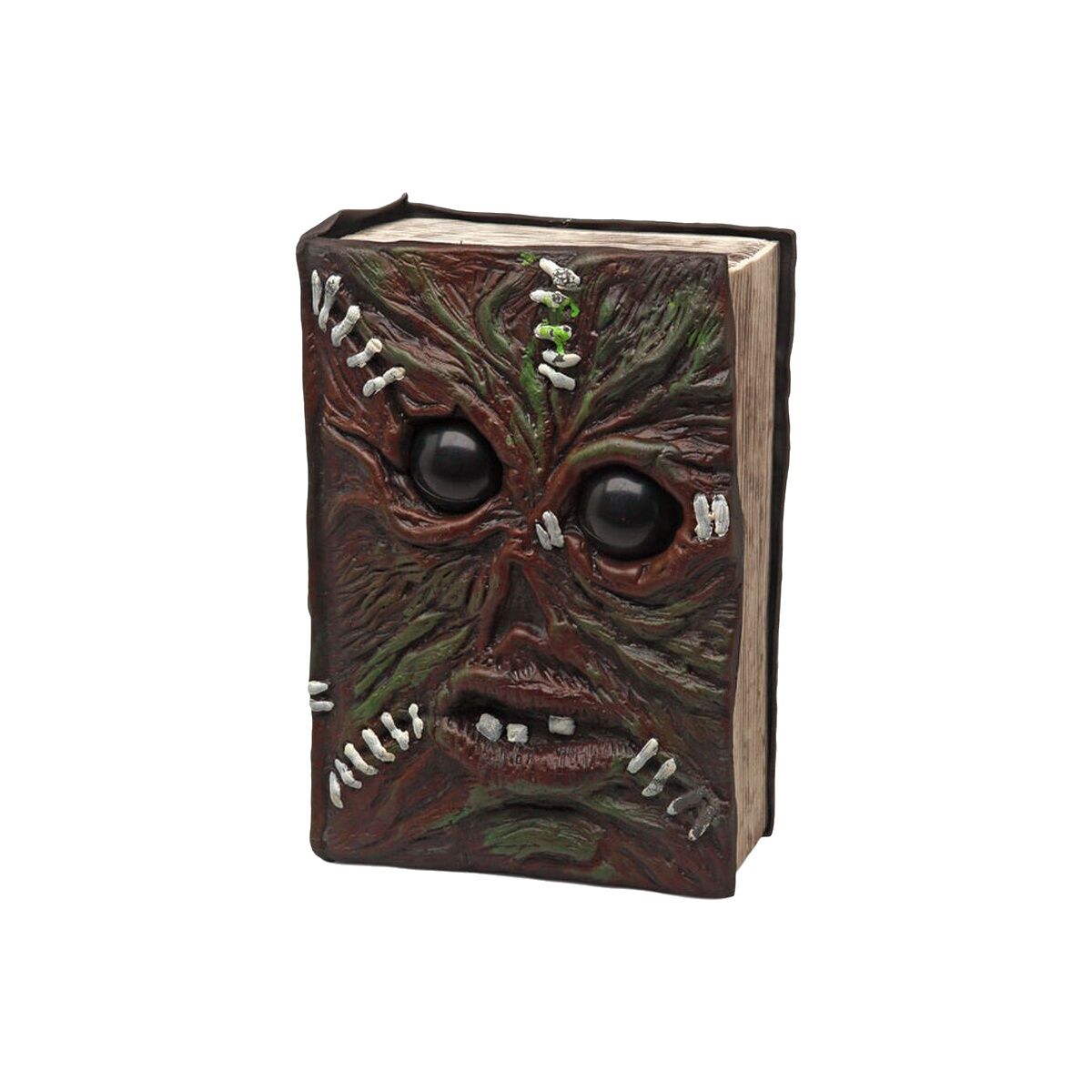 En läskig halloweendekoration i form av en bok med ett monsteransikte med hopsydda detaljer.