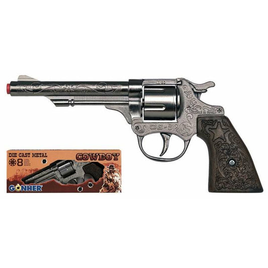 En bild som visar både den graverade cowboyrevolvern och dess förpackning.