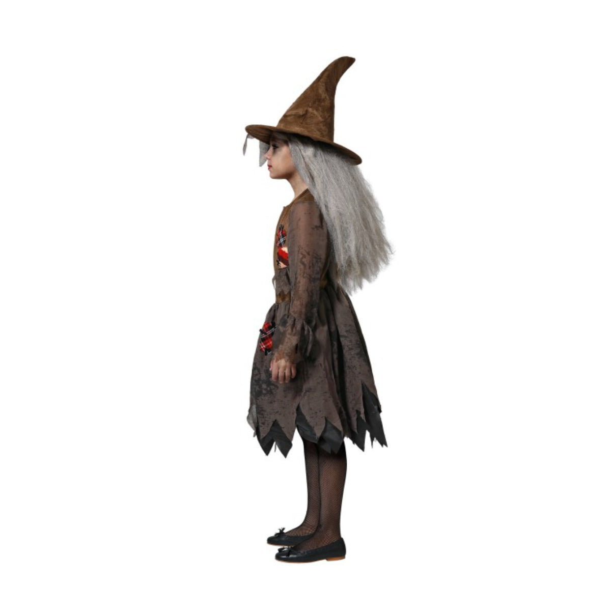 Sidan av ett barn som bär den bruna fågelskrämma-häxdräkten, vilket visar hattens form och klänningens lager.