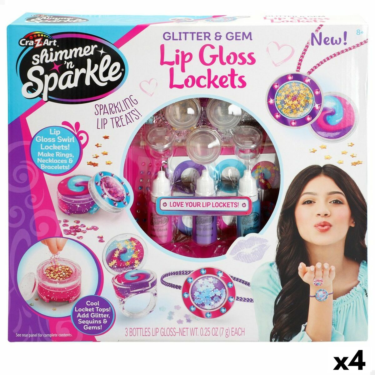 Förpackning till ett barnsminkset från Cra-Z-Art med titeln 'Shimmer 'n Sparkle Glitter & Gem Lip Gloss Lockets', som visar olika locketar fyllda med glitter som kan bäras som ringar eller halsband.