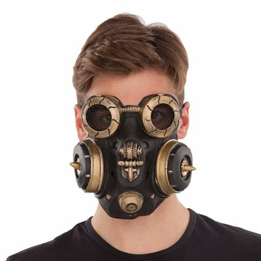 En man bär en tuff, industriell steampunk gasmask i svart och brons med detaljerade goggles och filter.