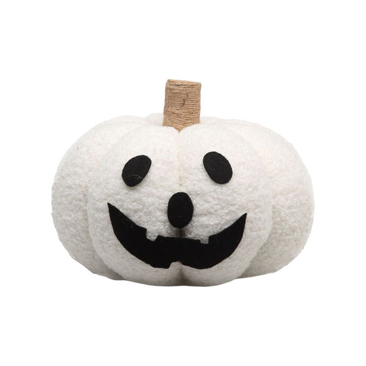 Vit halloweenpumpa med mjuk yta och svart ansikte i filt. Pumpan har ett glatt uttryck och dekorativ stil – perfekt för barnvänlig halloween.