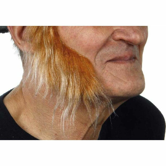 En man i profil visar upp ett par yviga, buskiga och orangea löspolisonger, perfekta för en vikinga- eller keltisk krigar-look.